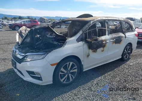 2020 Honda Odyssey Elite z USA, uszkodzony, nr VIN 5FNRL6H95LB027737